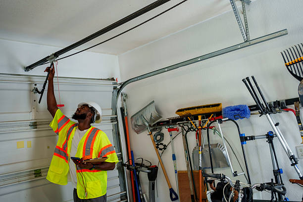 Professional Garage Door Panel Replacement technician working in Paris, TX